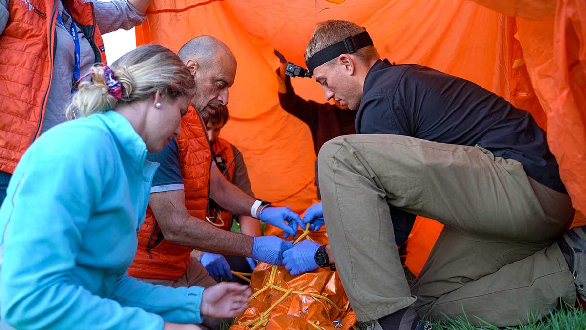 Treatment in safety tent in Wilderness Life Support course